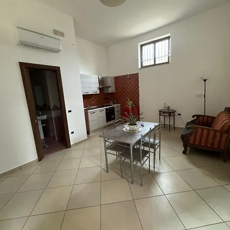 Rosso Milligio Piano Terra Apartment